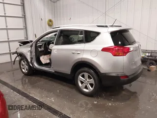 2014 Toyota RAV4 XLE with VIN JTMRFREV5ED052819, listed as a IAAI auction lot 42014672 with 235,481 mi miles and . Bid and sale history available at DreamBid. Image 3.