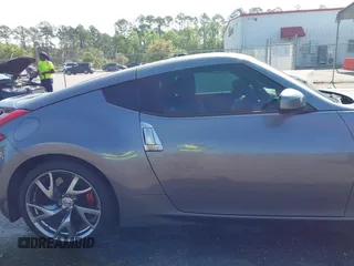 2013 Nissan 370Z with VIN JN1AZ4EH1DM880983, listed as a IAAI auction lot 41937876 with 130,613 mi miles. Bid and sale history available at carsss.com. Image 13.