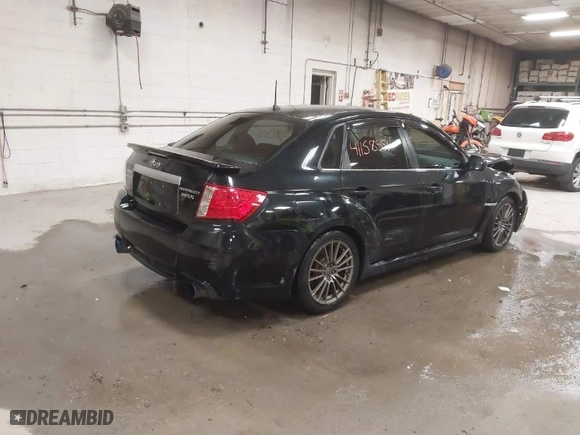 2011 Subaru Impreza Sedan WRX WRX Premium with VIN JF1GV7F6XBG517651, listed as a IAAI auction lot 41158551 with 141,334 mi miles. Bid and sale history available at carsss.com. Image 4.