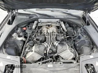 2013 BMW M5 z VIN WBSFV9C54DD095421, wystawiony jako Copart lot #53492515 z przebiegiem Nie podano mil oraz Szkoda całkowita • Salvage title. Historia ofert i sprzedaży dostępna na DreamBid. Obrazek 11.