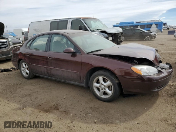 2001 Ford Taurus SES with VIN 1FAFP55S61G184193, listed as a Copart auction lot 49190475 with 129,415 mi miles and Salvage Title. Bid and sale history available at DreamBid. Image 4.