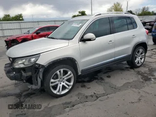 2013 Volkswagen Tiguan SE z VIN WVGBV7AXXDW548780, wystawiony jako Copart lot #55157985 z przebiegiem 92 767 mil mil oraz Szkoda całkowita • Salvage title. Historia ofert i sprzedaży dostępna na DreamBid. Obrazek 1.