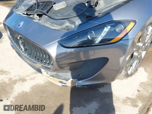 2013 Maserati GranTurismo Sport with VIN ZAM45VLA7D0074506, listed as a IAAI auction lot 41455462 with 34,292 mi miles and . Bid and sale history available at DreamBid. Image 6.