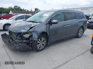 2016 Honda Odyssey EX-L with VIN 5FNRL5H69GB129807, listed as a IAAI auction lot 41973832 with 181,686 mi miles. Bid and sale history available at carsss.com. Image 2.