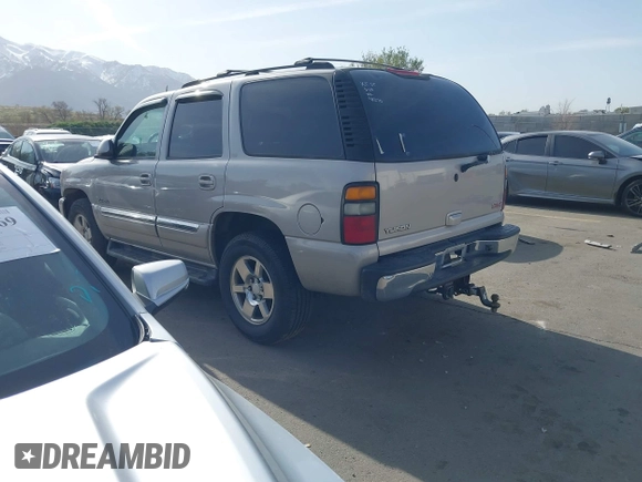 2005 GMC Yukon SLT with VIN 1GKEK13T15J118270, listed as a IAAI auction lot 41937413 with 218,057 mi miles. Bid and sale history available at carsss.com. Image 3.