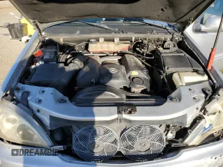 2000 Mercedes-Benz M-Class with VIN 4JGAB54E6YA181947, listed as a Copart auction lot 77781524 with 165,399 mi miles and Salvage Title. Bid and sale history available at carsss.com. Image 14.