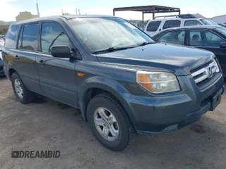 2006 Honda Pilot LX with VIN 2HKYF18146H556070, listed as a IAAI auction lot 42011915 with 145,112 mi miles. Bid and sale history available at carsss.com. Image 1.
