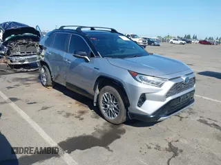 2021 Toyota RAV4 Hybrid XSE with VIN 4T3E6RFVXMU016087, listed as a IAAI auction lot 42136592 with 89,374 mi miles and . Bid and sale history available at DreamBid. Image 1.