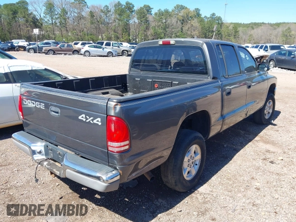 2002 Dodge Dakota SLT z VIN 1B7HG48NX2S623588, wystawiony jako IAAI lot #41793068 z przebiegiem 213 159 mil mil oraz . Historia ofert i sprzedaży dostępna na DreamBid. Obrazek 4.