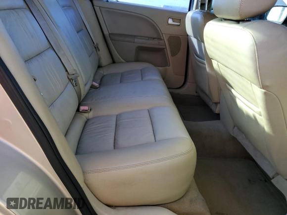 2006 Ford Five Hundred SE with VIN 1FAFP23146G150866, listed as a Copart auction lot 77141084 with 233,540 mi miles and Salvage Title. Bid and sale history available at carsss.com. Image 10.