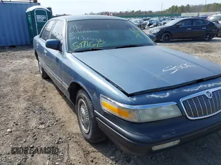 1996 Mercury Grand Marquis GS with VIN 2MELM74W8TX697141, listed as a IAAI auction lot 42082750 with 138,963 mi miles and . Bid and sale history available at DreamBid. Image 6.