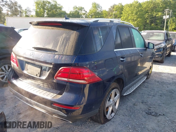 2017 Mercedes-Benz GLE 350 with VIN 4JGDA5JB7HA854738, listed as a IAAI auction lot 42183154 with 127,500 mi miles and . Bid and sale history available at DreamBid. Image 4.