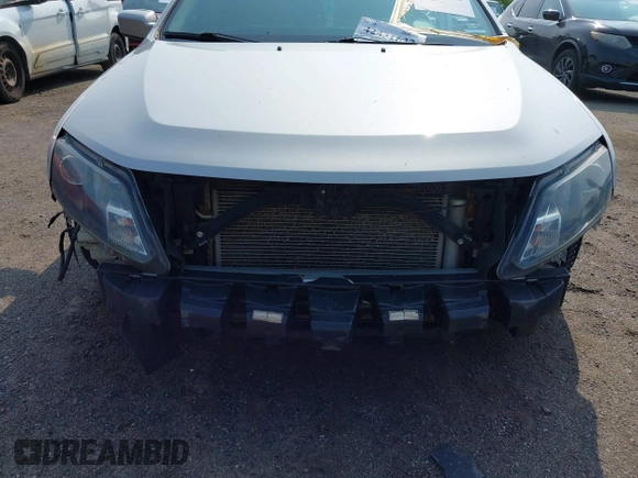 2010 Ford Fusion SE z VIN 3FAHP0HA8AR350320, wystawiony jako IAAI lot #42431622 z przebiegiem 245 719 mil mil oraz . Historia ofert i sprzedaży dostępna na DreamBid. Obrazek 13.