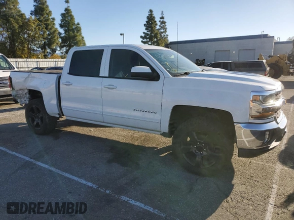 2018 Chevrolet Silverado 1500 LT with VIN 3GCPCREC3JG200722, listed as a Copart auction lot 48405655 with 97,384 mi miles and Salvage Title. Bid and sale history available at DreamBid. Image 4.