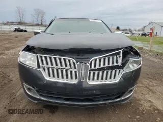 2012 Lincoln MKZ z VIN 3LNHL2JC3CR816733, wystawiony jako Copart lot #51353215 z przebiegiem 149 256 mil mil oraz Szkoda całkowita • Salvage title. Historia ofert i sprzedaży dostępna na DreamBid. Obrazek 5.