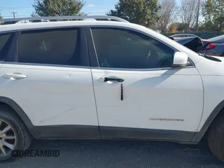 2014 Jeep Cherokee Limited with VIN 1C4PJLDSXEW118473, listed as a IAAI auction lot 41359322 with 111,000 mi miles. Bid and sale history available at carsss.com. Image 12.