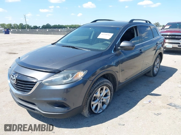 2015 Mazda CX-9 Sport with VIN JM3TB2BA7F0465965, listed as a IAAI auction lot 40348982 with 165,284 mi miles and . Bid and sale history available at carsss.com. Image 2.