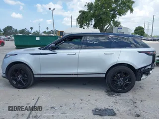 2021 Land Rover Range Rover Velar R-Dynamic S z VIN SALYT2EX9MA315965, wystawiony jako IAAI lot #42344448 z przebiegiem 66 819 mil mil oraz . Historia ofert i sprzedaży dostępna na DreamBid. Obrazek 15.