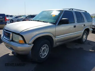 1999 GMC Jimmy SLE with VIN 1GKDT13W5X2539067, listed as a IAAI auction lot 41979222 with 1 mi miles. Bid and sale history available at carsss.com. Image 17.