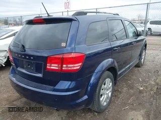2017 Dodge Journey SE with VIN 3C4PDCAB9HT590394, listed as a IAAI auction lot 41838214 with 71,442 mi miles and . Bid and sale history available at DreamBid. Image 4.