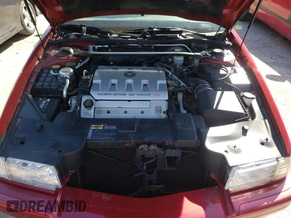 2000 Cadillac Eldorado Touring ETC z VIN 1G6ET129XYU191433, wystawiony jako Copart lot #58108224 z przebiegiem 76 957 mil mil oraz Szkody całkowita. Historia ofert i sprzedaży dostępna na DreamBid. Obrazek 11.