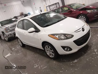 2014 Mazda 2 Touring z VIN JM1DE1LY6E0171403, wystawiony jako IAAI lot #41416489 z przebiegiem 84 494 mil mil oraz . Historia ofert i sprzedaży dostępna na DreamBid. Obrazek 1.