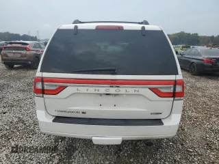 2015 Lincoln Navigator z VIN 5LMJJ3HT1FEJ03496, wystawiony jako Copart lot #77615394 z przebiegiem 118 636 mil mil oraz Szkoda całkowita • Salvage title. Historia ofert i sprzedaży dostępna na DreamBid. Obrazek 6.