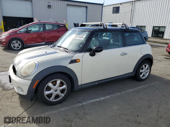 2010 MINI Hardtop with VIN WMWMF3C57ATU77370, listed as a Copart auction lot 50078605 with 187,187 mi miles and Salvage title. Bid and sale history available at DreamBid. Image 1.