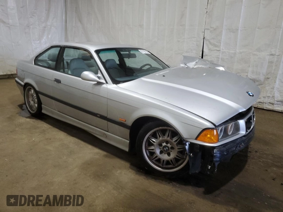 1999 BMW 3 Series M3 with VIN WBSBG9330XEY81402, listed as a Copart auction lot 87192194 with 215,226 mi miles and Salvage Title. Bid and sale history available at carsss.com. Image 4.