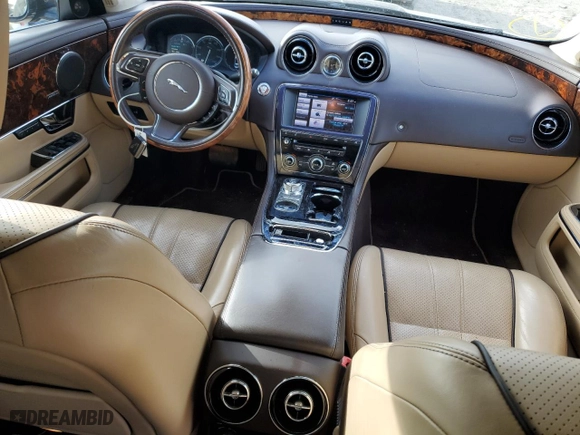 2013 Jaguar XJ with VIN SAJWA2G12DLV57581, listed as a Copart auction lot 84736054 with 91,779 mi miles and Salvage Title. Bid and sale history available at carsss.com. Image 8.