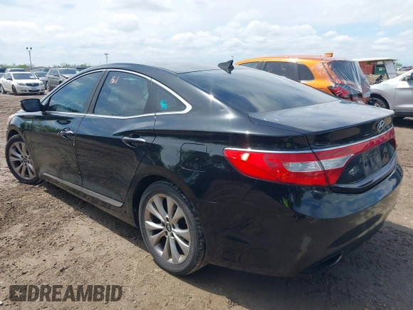 2014 Hyundai Azera with VIN KMHFG4JG3EA354276, listed as a IAAI auction lot 41892879 with 114,147 mi miles and . Bid and sale history available at carsss.com. Image 3.