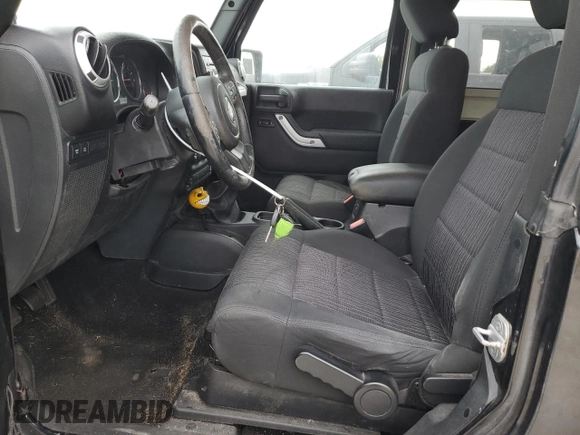 2011 Jeep Wrangler Rubicon with VIN 1J4BA6D15BL585388, listed as a Copart auction lot 76272184 with 119,043 mi miles and Clean title. Bid and sale history available at DreamBid. Image 7.