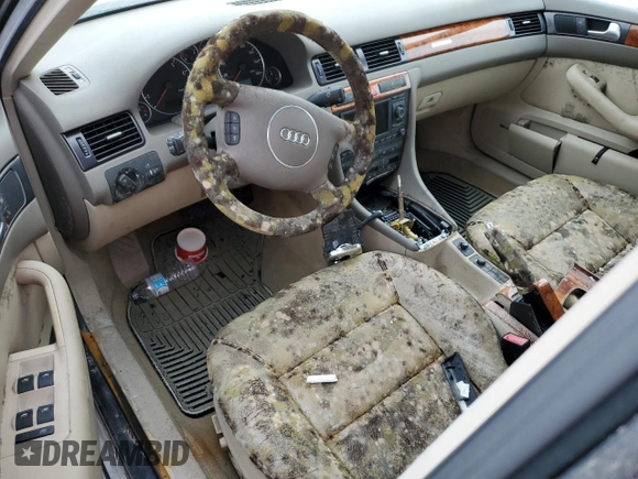 2004 Audi A6 z VIN WAUML54B04N013211, wystawiony jako Copart lot #74279954 z przebiegiem Nie podano mil oraz Szkoda całkowita • Salvage title. Historia ofert i sprzedaży dostępna na DreamBid. Obrazek 8.