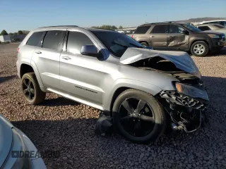 2016 Jeep Grand Cherokee High Altitude with VIN 1C4RJFCG5GC465480, listed as a Copart auction lot 85727504 with 106,339 mi miles and Salvage Title. Bid and sale history available at carsss.com. Image 4.
