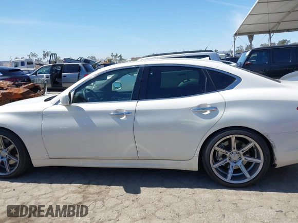 2013 Infiniti M with VIN JN1BY1AP6DM511104, listed as a IAAI auction lot 41818184 with 138,605 mi miles and . Bid and sale history available at DreamBid. Image 15.