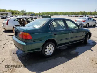 2000 Honda Civic LX with VIN 1HGEJ6677YL027802, listed as a Copart auction lot 52995445 with 221,233 mi miles and Salvage Title. Bid and sale history available at carsss.com. Image 3.