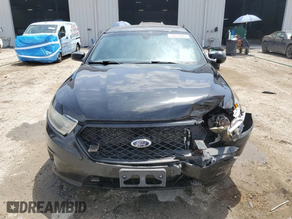 2014 Ford Police Interceptor with VIN 1FAHP2MT2EG161579, listed as a Copart auction lot 53878845 with 205,031 mi miles and Salvage title. Bid and sale history available at DreamBid. Image 5.