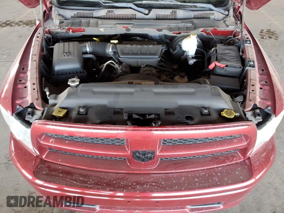 2012 Ram 1500 Tradesman with VIN 1C6RD6KP2CS296003, listed as a Copart auction lot 82170314 with 136,216 mi miles and Salvage title. Bid and sale history available at DreamBid. Image 11.