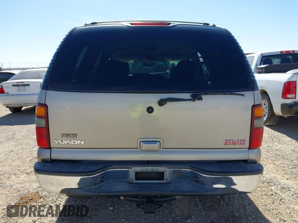 2003 GMC Yukon SLT with VIN 1GKEC13V33R298333, listed as a IAAI auction lot 41582447 with 166,047 mi miles. Bid and sale history available at carsss.com. Image 16.