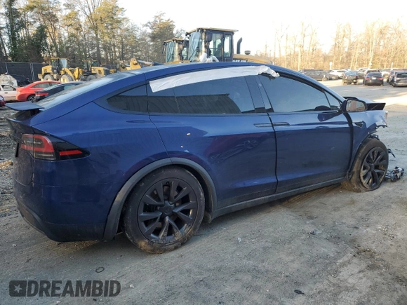 2022 Tesla Model X with VIN 7SAXCDE59NF358968, listed as a Copart auction lot 45954875 with Not Provided miles and Salvage Title. Bid and sale history available at DreamBid. Image 3.