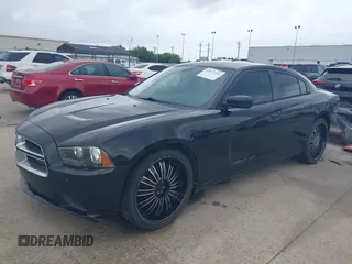 2014 Dodge Charger SE with VIN 2C3CDXBG8EH215850, listed as a IAAI auction lot 42077242 with 179,360 mi miles and . Bid and sale history available at carsss.com. Image 18.