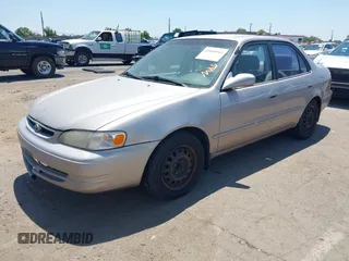 1998 Toyota Corolla VE with VIN 1NXBR18E8WZ105435, listed as a IAAI auction lot 42660562 with 295,050 mi miles and . Bid and sale history available at DreamBid. Image 2.