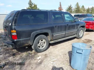 2004 Chevrolet Suburban LT z VIN 1GNFK16Z94J122458, wystawiony jako IAAI lot #41889018 z przebiegiem 180 507 mil mil oraz . Historia ofert i sprzedaży dostępna na DreamBid. Obrazek 4.