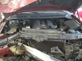 2004 Nissan Titan SE z VIN 1N6AA06A84N590696, wystawiony jako Copart lot #55947145 z przebiegiem 244 851 mil mil oraz Szkoda całkowita • Salvage title. Historia ofert i sprzedaży dostępna na DreamBid. Obrazek 11.