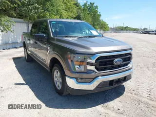 2023 Ford F-150 XL z VIN 1FTEW1C8XPFA61245, wystawiony jako IAAI lot #42692758 z przebiegiem 50 935 mil mil oraz . Historia ofert i sprzedaży dostępna na DreamBid. Obrazek 1.