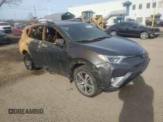 2018 Toyota RAV4 XLE z VIN 2T3RFREV4JW767488, wystawiony jako Copart lot #78574824 z przebiegiem Nie podano mil oraz Nie do naprawy • Non repairable. Historia ofert i sprzedaży dostępna na DreamBid. Obrazek 4.