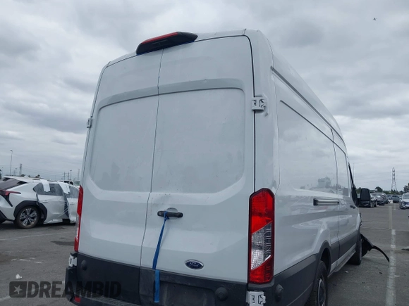 2020 Ford Transit Cargo with VIN 1FTBW3XG2LKB18281, listed as a IAAI auction lot 42022187 with 84,323 mi miles and . Bid and sale history available at DreamBid. Image 4.