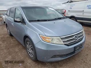 2011 Honda Odyssey EX-L with VIN 5FNRL5H64BB085479, listed as a IAAI auction lot 42404637 with 185,624 mi miles and . Bid and sale history available at DreamBid. Image 6.
