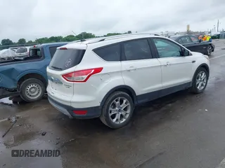 2016 Ford Escape Titanium with VIN 1FMCU9JX4GUB72080, listed as a IAAI auction lot 42519240 with 121,793 mi miles and . Bid and sale history available at DreamBid. Image 4.