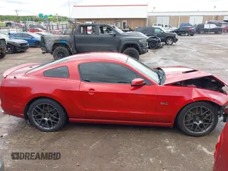 2013 Ford Mustang GT with VIN 1ZVBP8CF5D5209257, listed as a IAAI auction lot 42141198 with 124,462 mi miles and . Bid and sale history available at DreamBid. Image 14.